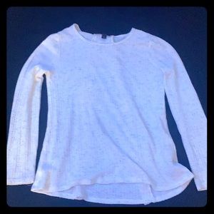 White sweater with lace in the back